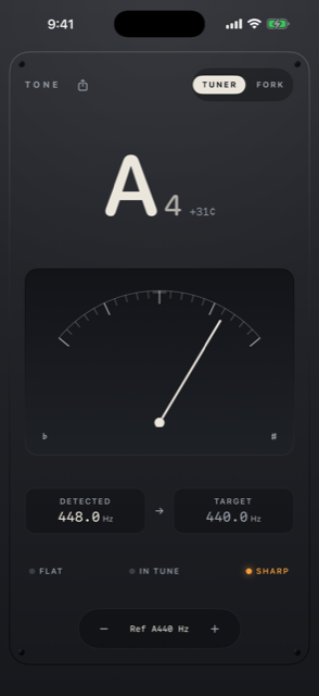 Tuner screen while sharp: monochrome needle leaning right, amber-free graphite face.
